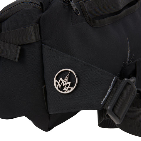 Close up of HEX Ranger DSLR Sling Misshattan, showing logo on waist strap