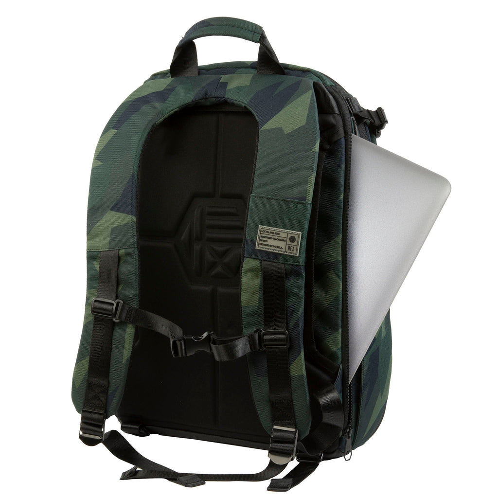 HEX Ranger Clamshell Camo DSLR Backpack, rear view, with laptop partially extending out of side pocket