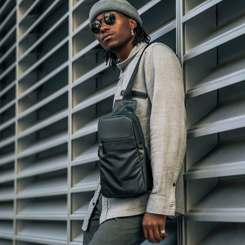 Man wearing black HEX Nero Shoulder Bag