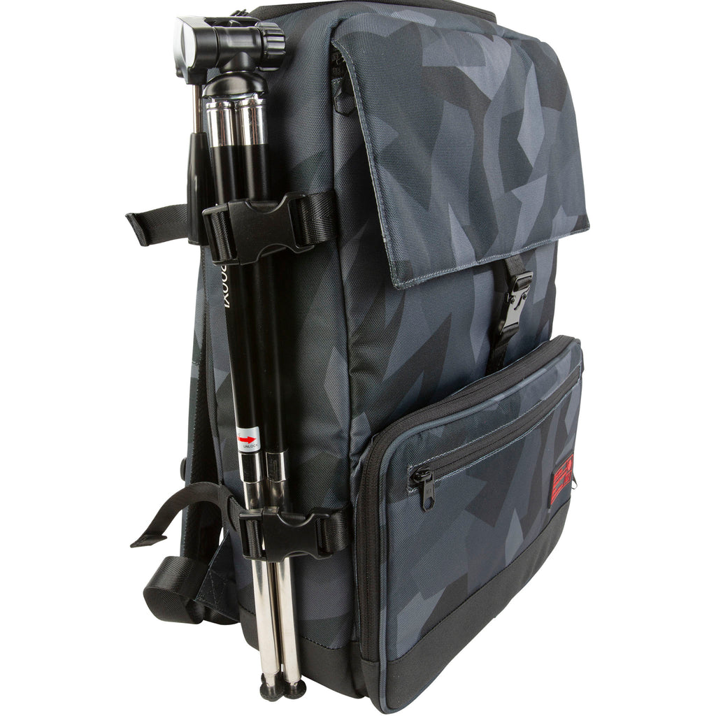 Side view of the Hex Glacier Camo Back Loader DSLR Backpack with a tripod attached to the pack