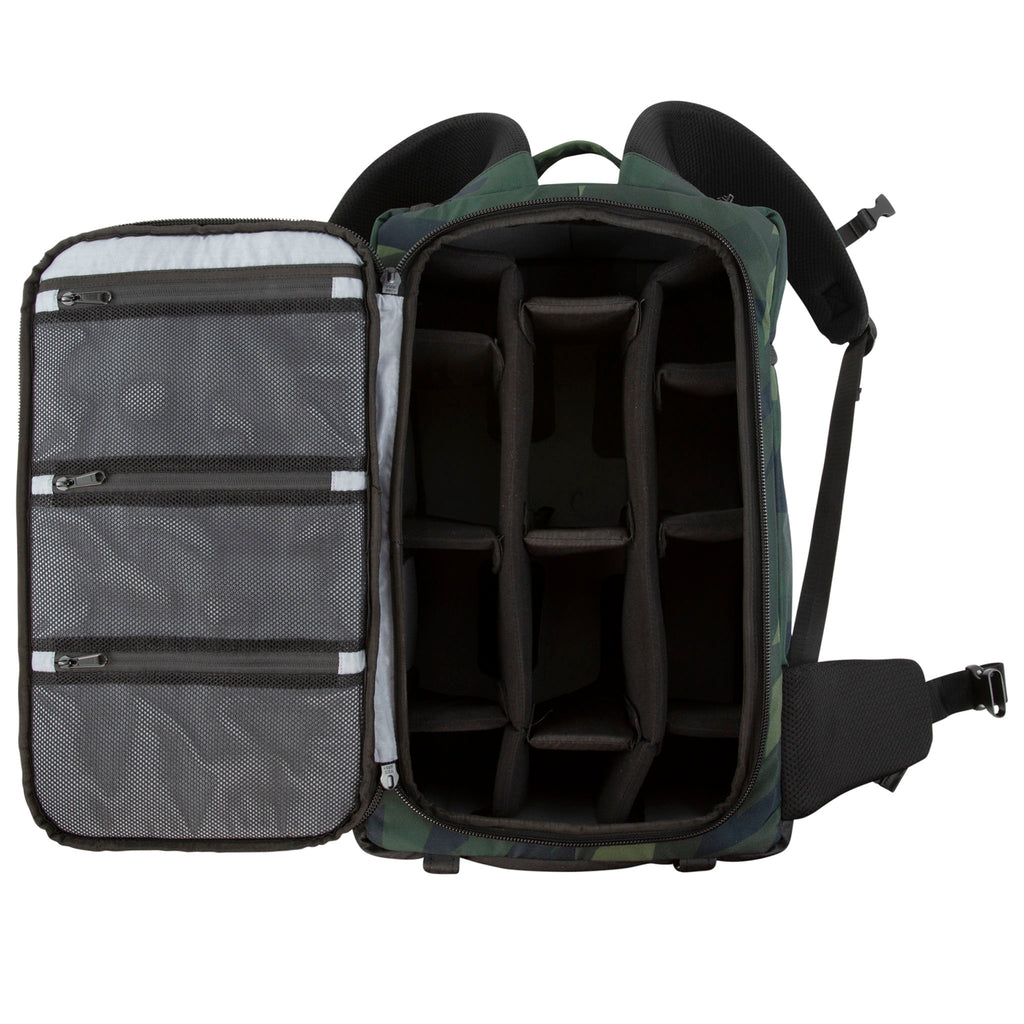Cinema Backpack, Green Camo. Front view. Main compartment open, showing grey interior with pockets and padded interior organizer.