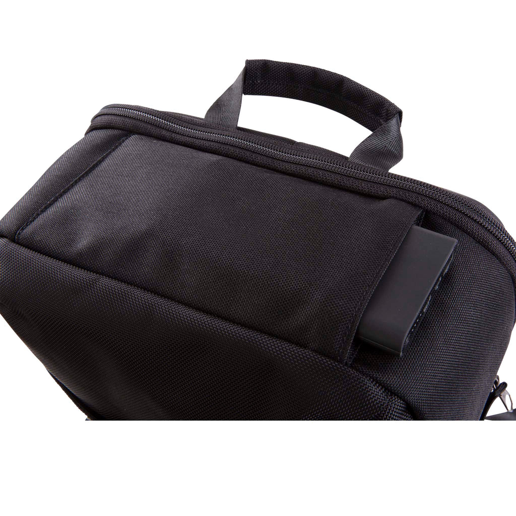 HEX Technical Backpack Glacier Camo, top view, showing wireless charger partially extending from pocket