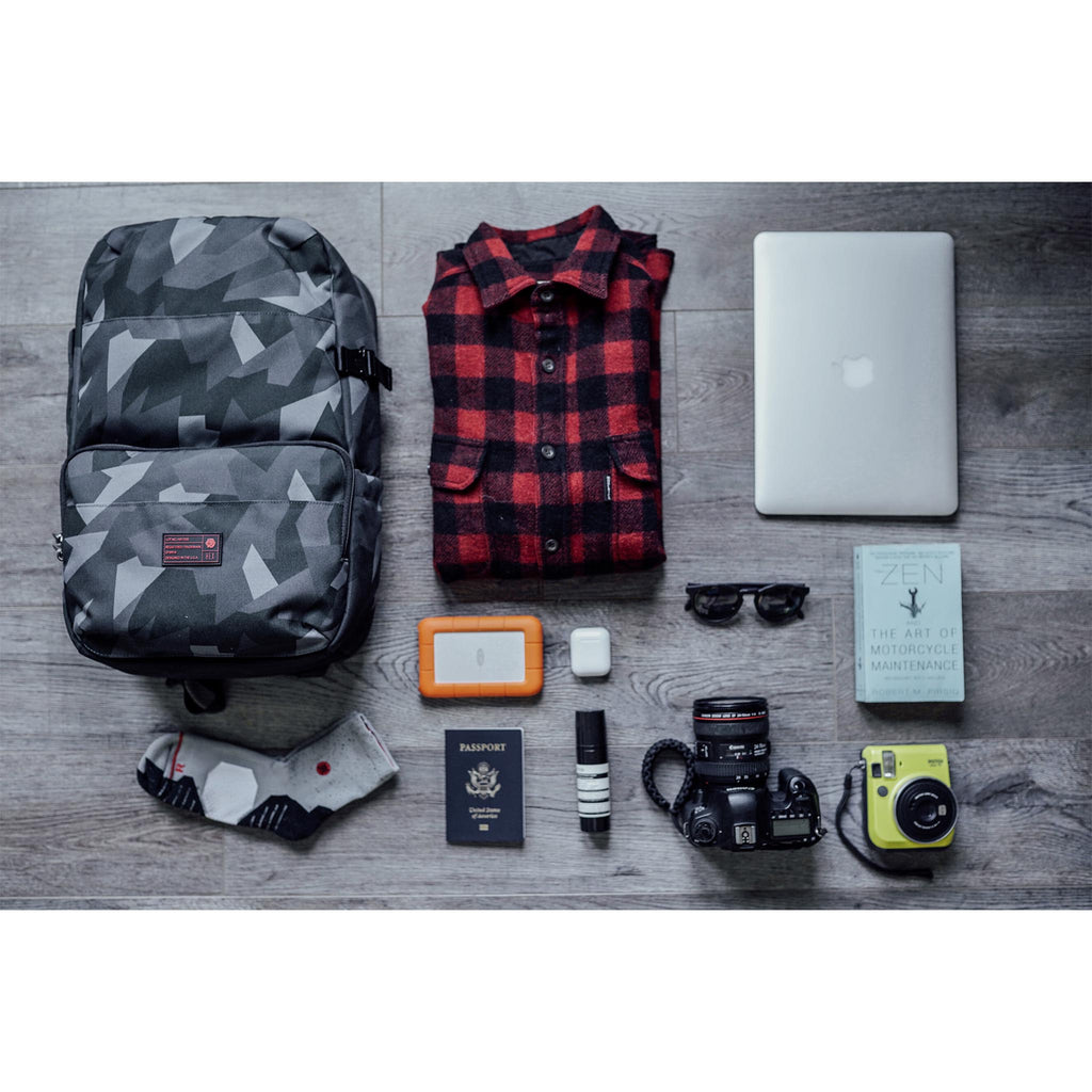 HEX Technical Backpack Glacier Camo, with examples of gear that can be stored inside