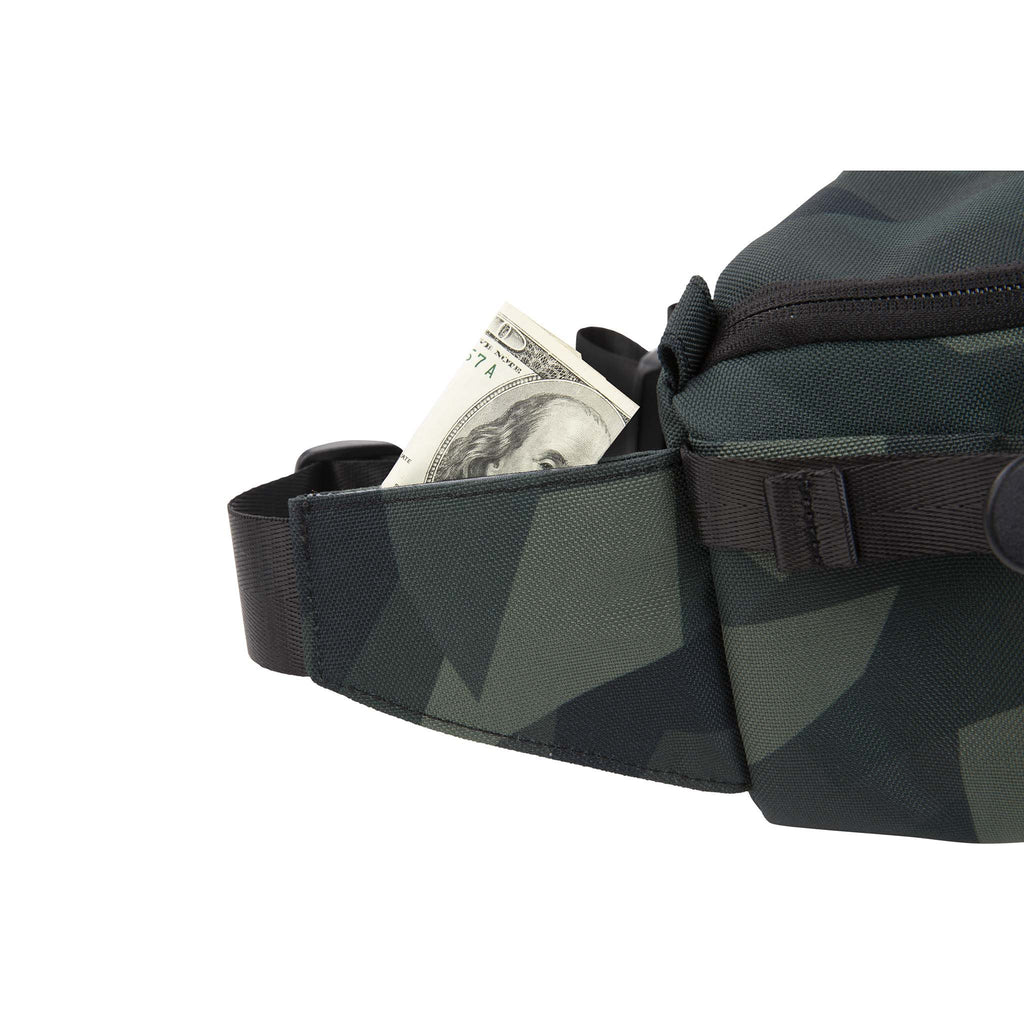 HEX Ranger DSLR Mini Sling, Camo, side view of hidden velcro stash pocket holding money
