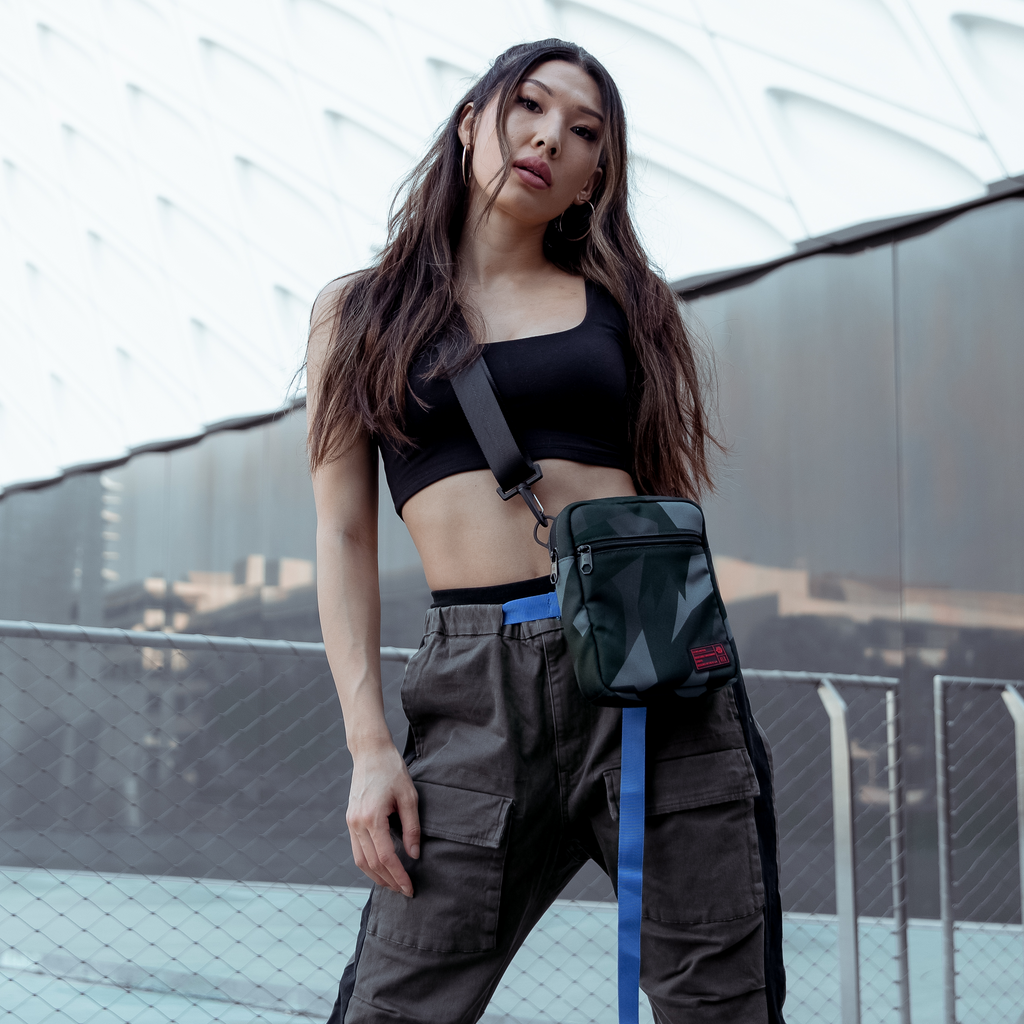 Woman wearing the Ranger Camera Crossbody Glacier Camo